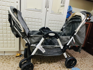 Double stroller like new for two babies