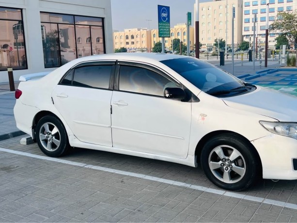 corolah-2009-modle-japan-mulkai-2-month-gadi-good-condition-loction-bani-yas-0562375534-big-0